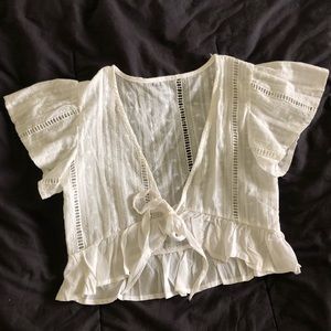 Cropped tie front blouse